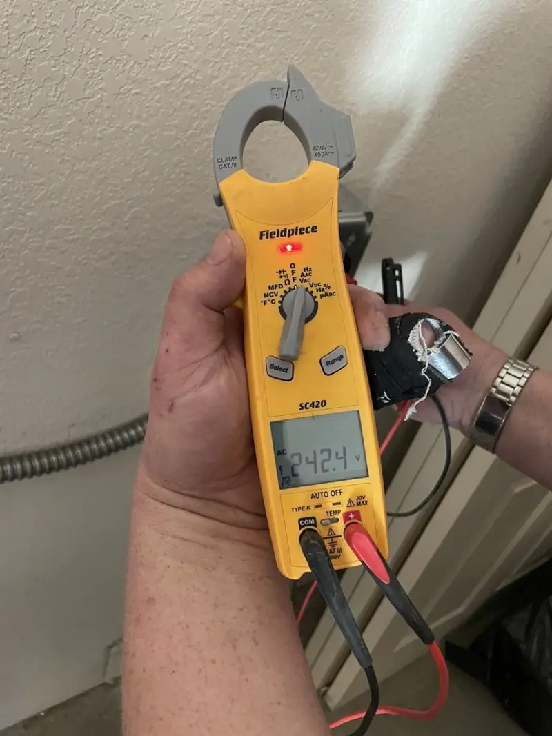 Voltage testing with clamp meter during Circuit Breaker Repair in Elizabeth